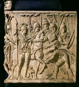 Relief from a sarcophagus depicting the submission of a barbarian to a Roman troop